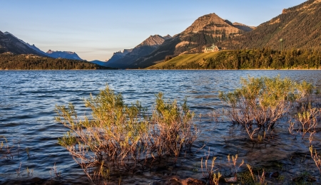 Across the lake is the Prince of Wales Hotel and the far end of the lake is Glacier National Park in the States の写真素材