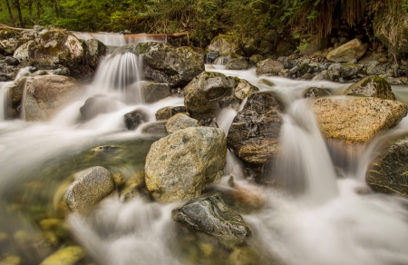 Water flowing over rocks with a slow shutter speedの写真素材
