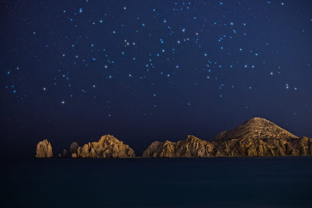 Starry night shot of rock formations in Cabo San Lucusの写真素材