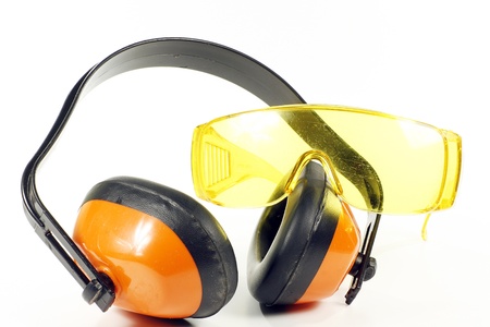 orange ear defenders and safety glasses, isolated on a white backgroundの写真素材
