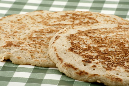 traditional derbyshire oatcakes on a gingham clothの写真素材