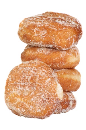 Stack of fresh baked sugary doughnuts isolated on a white backgroundの写真素材