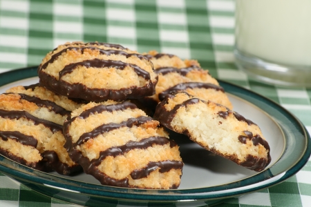 pile of delicious coconut macaroons with a chocolate coatingの写真素材