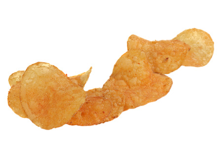      chilli and sour cream flavoured potato crisps isolated on a white backgroung                          の写真素材