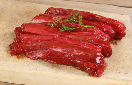 uncooked belly pork marinaded in chinese five spice                               の写真素材