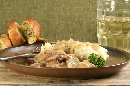 gammon hock in cider with mustard mashの写真素材