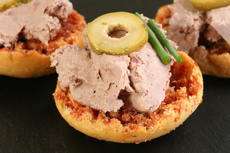 toasted bruschetta with sun dried tomato olive and garlic pateの写真素材