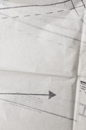 Sewing pattern on thin paper backgroundの写真素材