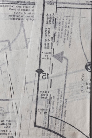 Sewing pattern on thin paper background