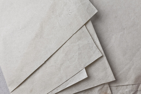 Stack or pile of old abstract paper textured backgroundsの写真素材