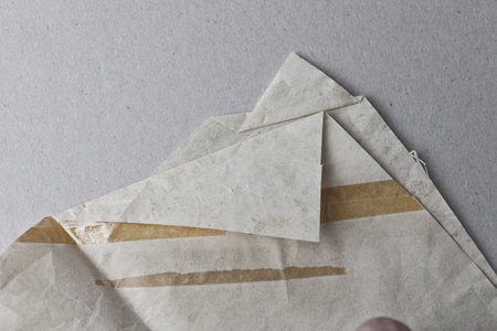 Old abstract paper textured backgrounds with old yellow tapeの写真素材