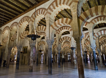 The famous Red and white arches of La Mezquita in CÃÂ³rdoba in the southern Spanish province of Andalusia. Formerly a Roman city and an Islamic cultural center in the Middle Ages.の写真素材