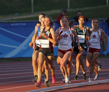 MONCTON, CANADA - June 22: Madeline Yungblut leads the pack in the 5,000-meter run at the Canadian Track & Field Championships June 22, 2013 in Moncton, Canada.のeditorial素材