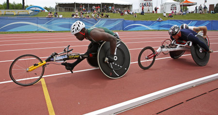 MONCTON, CANADA - June 22: 10,000-meter run wheelchair athletes Jean-Paul Compaore and Michel...