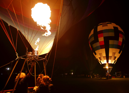 Night balloon glow at the 30th annual Atlantic International Balloon Fiesta in Sussex, New Brunswick, Canada, Sept. 12, 2015.のeditorial素材