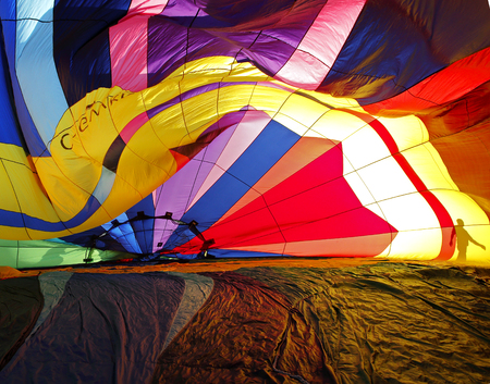 The inside pattern of a hot air balloon as it inflates for the evening launch at the 30th annual Atlantic International Balloon Fiesta in Sussex, New Brunswick, Canada, Sept. 12, 2015.のeditorial素材