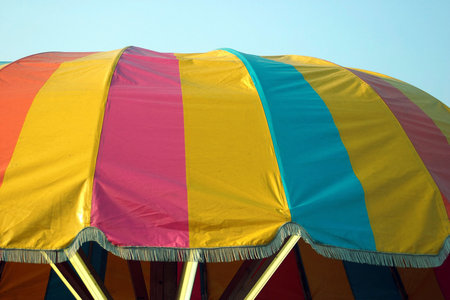 A colorful roof at a fair.の写真素材