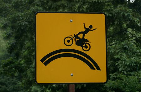 A caution sign for motorcycles.の写真素材