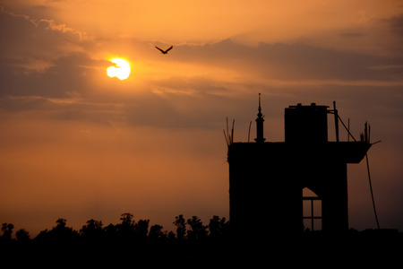 Under-construction Mosque in sunset の写真素材