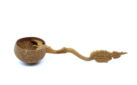 dipper made from Coconut shell on white backgroundの写真素材