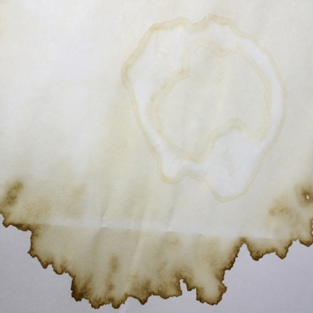 Texture - a sheet of the old paper with drops of coffeeの写真素材