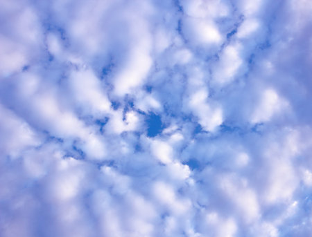 blue sky background with tiny cloudsの写真素材