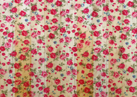 Rose vintage from fabric on white wooden background.の写真素材