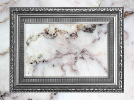 Gray frame Vintage photo frame on marble stone wall backgroundの写真素材