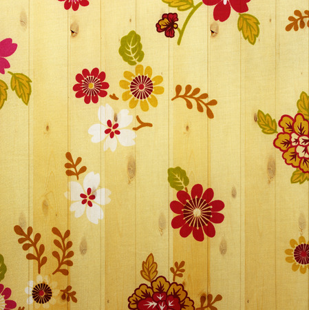 Flower vintage from fabric on wooden wall background.の写真素材