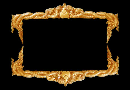 old decorative gold frame - handmade, engraved - isolated on black backgroundの写真素材
