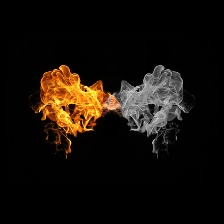 fire flame and smoke on black backgroundの写真素材