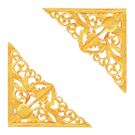 Pattern of wood carve gold paint for decoration on white backgroundの写真素材