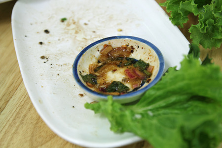 Food scraps left in food dishes and salads.の写真素材