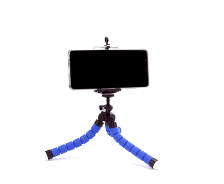Mobile Phone isolated on tripod in white backgroundの写真素材