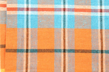 The background of the fabric is Scottish pattern.