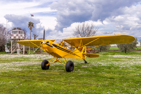 Nice yellow plane at the Airfieldの写真素材