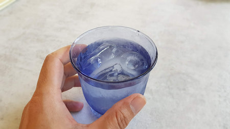 blue glass with full water