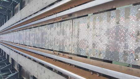 Rusty old steel train railの写真素材