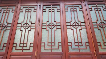 ancient red china wood doorの写真素材