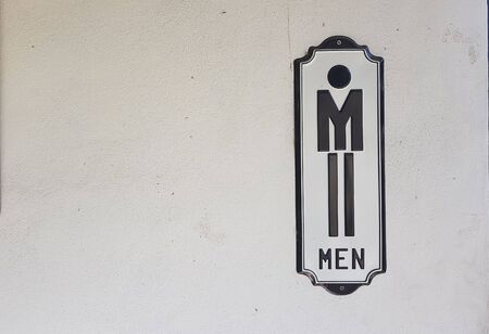closeup men restroom logo signの写真素材