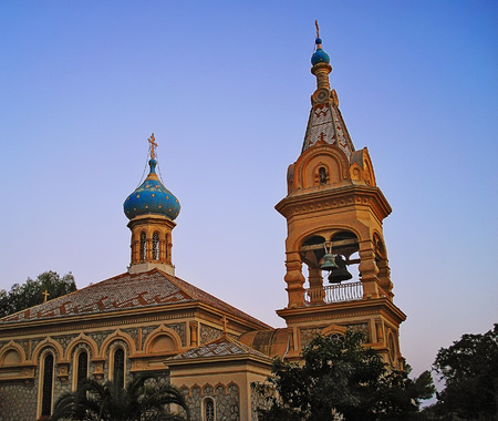 dome and belltower of Russian Orthodox Church in the city of Cannes at sunsetのeditorial素材