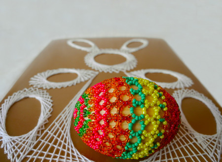 Rabbit and egg, sheathed beads, Easter symbols.の写真素材