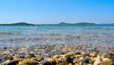 Pebbles close-up on the beach in Vodice, Croatia.の写真素材