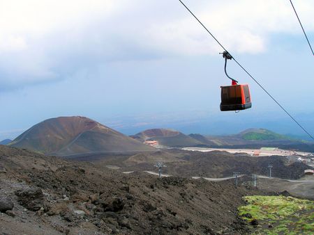 The cable car of Etna among the craters.の写真素材