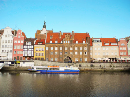 Gdansk, Poland - 8 May, 2015: Landscape architecture and river bank view of ancient port of Motlava...