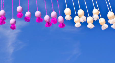 Easter decoration on the blue sky background.の写真素材