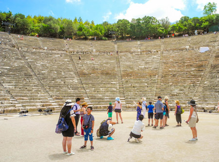 Epidaurus, Greece - July 18, 2017: Ancient Greek amphitheater Epidaurus, island of Peloponnese,...
