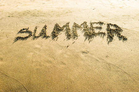 The inscription summer on clean sand beach.の写真素材