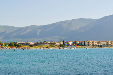 Vacationers on the beautiful clean sandyÂ Alikanas beach, Zakynthos, Greece.の写真素材