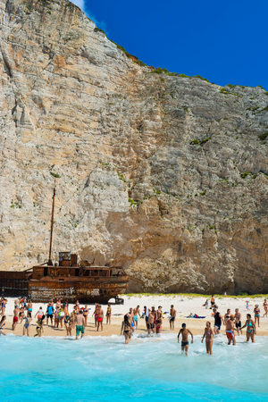 Shipwreck Bay, Zakynthos Island, Greece - July 26, 2017: Tourists on the Shipwreck Beach.のeditorial素材